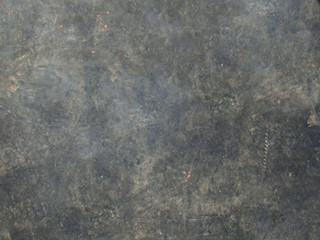 Abstract grey texture of old surface in scuffs and cracks
