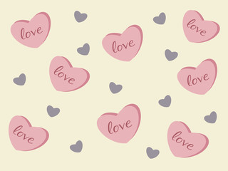 The word love in pink hearts on a light yellow background with small gray hearts