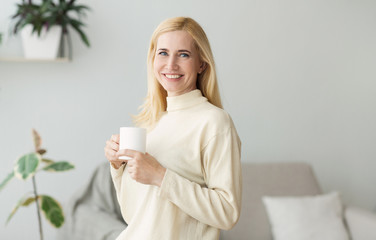 Happy Woman Drinking Morning Coffee, Resting At Home