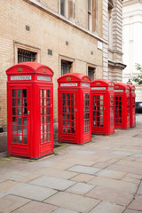 Obraz premium Famous red telephone booths in Covent Garden street, London, England