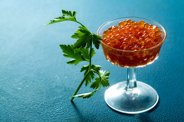 portion of red caviar on the table