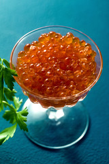 portion of red caviar on the table