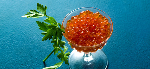 banner of portion of red caviar on the table