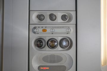 Aircraft overhead bin control panel for air condition and light