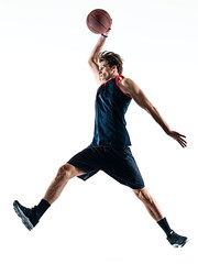 one caucasian basketball player man isolated in silhouette shadow on white background