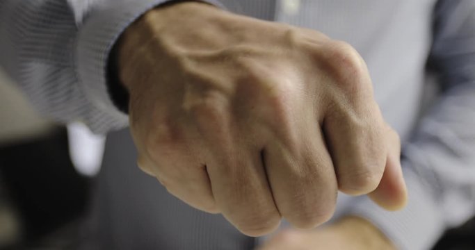 Businessman hands show Bitcoin BTC coins.