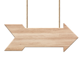 Wooden arrow shape signpost or signboard made of bright wood hanging on ropes