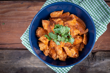 indian butter chicken dish with cilantro on top