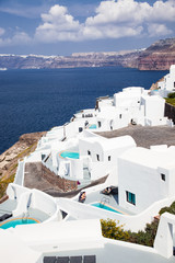Fototapeta premium traditional white architecture over the Caldera, Aegean sea. Scenic travel background, Santorini