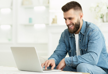 Freelancer Man Working On Laptop Online At Home