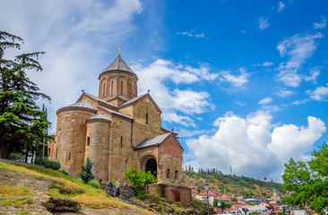 Fototapeta na wymiar Metekhi St. Virgin Church over Kura river, Tbilisi, Georgia