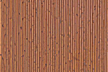 Yellow roses on a dark wooden background, copy space. A bouquet of beautiful flowers and a writing Board. A place to write a text about love.