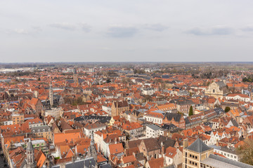 Naklejka na ściany i meble Bruges, Belgium - APRIL 05, 2019: View from above the Belfry tower in Bruges. Panoramic view