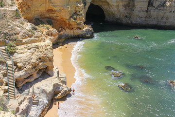 Beautiful natural arch on cliffs of Beach (Vale Covo), Carvoeiro, Algarve, Portugal