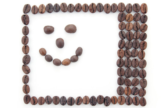 the frame made of coffee beans. smiling face