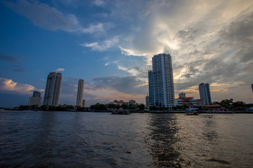 Sathon Pier Ferry Crossing - Bangkok: 25 May 2019,the atmosphere on the Chao Phraya River,close to Saphan BTS station Taksin and there is a temple near (Wat Yannawa) in Yan Nawa area, Sathon,Thailand