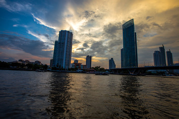 Sathon Pier Ferry Crossing - Bangkok: 25 May 2019,the atmosphere on the Chao Phraya River,close to Saphan BTS station Taksin and there is a temple near (Wat Yannawa) in Yan Nawa area, Sathon,Thailand