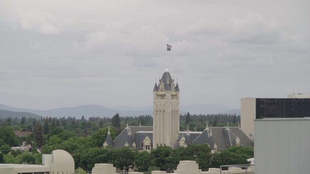 Courthouse in Spokane, Washington with an American flag and POW-MIA flag on top.
