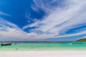 Clear water and blue sky at the paradise island in the tropical sea of Thailand