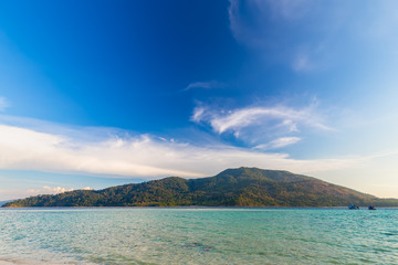 Clear water and blue sky at the paradise island in the tropical sea of Thailand