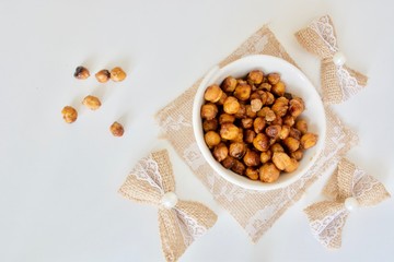 Tasty baked sweet cheackpea in the white bowl.