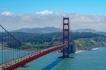 Famous Golden Gate Bridge. Suspension bridge spanning the Golden Gate. The structure links the American city of San Francisco, California – the northern tip of the San Francisco Peninsula – to Marin C