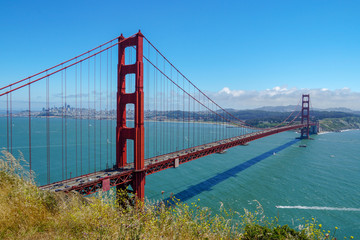 Famous Golden Gate Bridge. Suspension bridge spanning the Golden Gate. The structure links the American city of San Francisco, California, the northern tip of the San Francisco Peninsula to Marin C