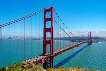 Famous Golden Gate Bridge. Suspension bridge spanning the Golden Gate. The structure links the American city of San Francisco, California, the northern tip of the San Francisco Peninsula to Marin C