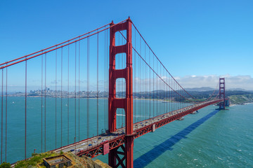 Famous Golden Gate Bridge. Suspension bridge spanning the Golden Gate. The structure links the American city of San Francisco, California, the northern tip of the San Francisco Peninsula to Marin C