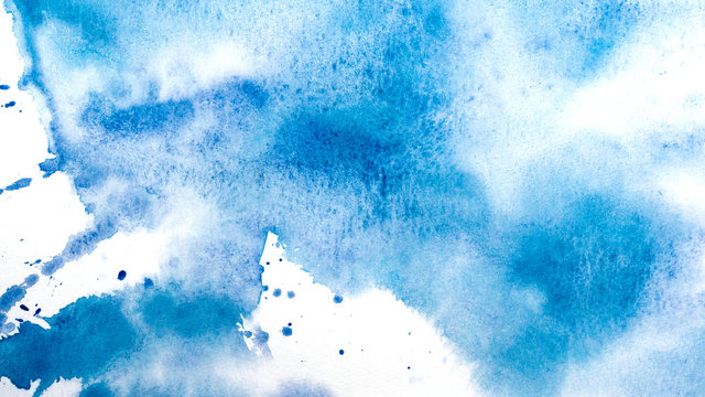 Abstract watercolor painting. Textured background. Drips of blue paint on canvas.