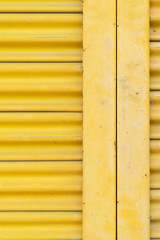 Yellow steel door, beautiful proportions. Can be used as a design background.