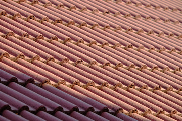 Ceramic tile roof, red color, with sunlight and background