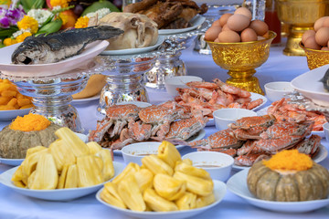 Sacrificial offering food for pray to god and memorial to ancestor, Bangkok, Thailand. Traditional offerings to gods with food, vegetable and fruit for the gods of Thai culture