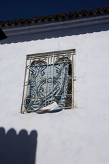 Windows seen in Chefchaouen, Morocco