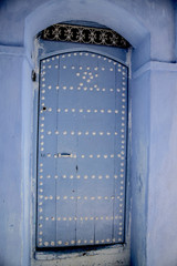 The blue doors of Chefchaouen, Morocco with their unique style