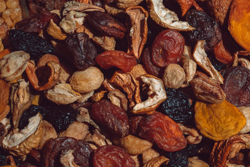 Dry fruits close up photo on market. Almond, Fennel, Apricot, Arrowroot, Cantaloupe. Background texture.