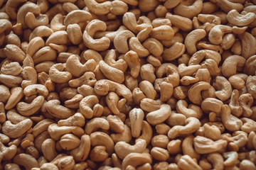 Cashew nuts close up photo on market. Peanuts, chestnuts, hazel. Can also work as background texture.