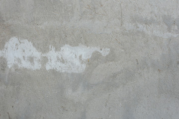 Texture, wall, concrete, it can be used as a background. Wall fragment with scratches and cracks