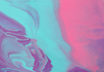 photography of abstract marbleized effect background. mint, pink and purple creative colors....