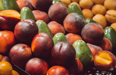 Fruits close up photo on market. Background texture. 