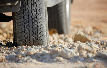 Fototapeta na wymiar Dirt road tire on dirt track