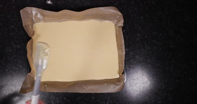 Lady Showing Finished Raw Batter Ready To Be Put Into Oven 4K 30FPS - Oven, Hot, Baking, Tray