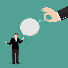 Hand pushing needle to pop speaking balloon