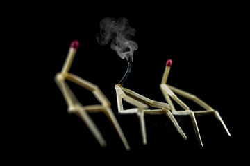 Image of matchsticks isolated in the dark and fading, Hikikomori concept, social isolation syndrome, depression and sadness.