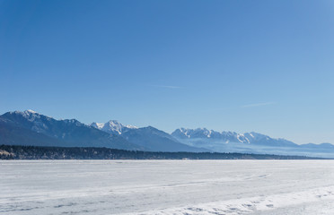 INVERMERE, CANADA - MARCH 21, 2019: town on the Windermere Lake early spring landscape.