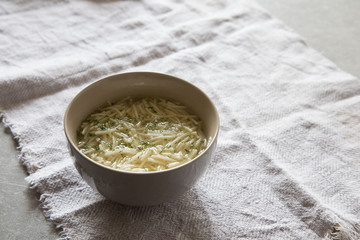 Bowl of chicken noodle soup. Homemade tasty Chicken soup in white bowl.