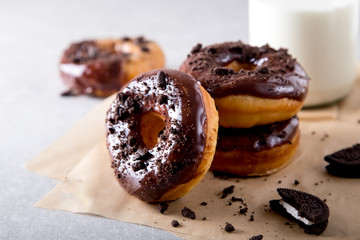 Pastries concept. Donuts with chocolate glaze and chocolate cookies