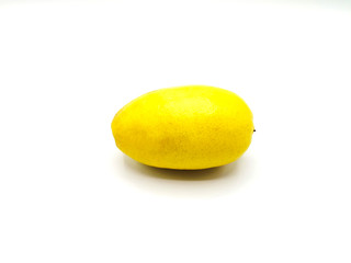 Whole fresh ripe lemon isolated on white background