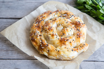 Vertuta, traditional Romanian, Moldavian or Balkan baking pie. Spiral filo pastry pie