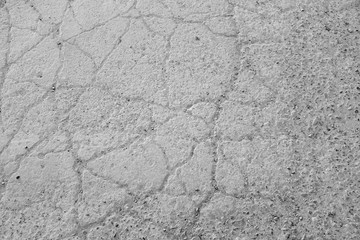 cracked asphalt texture, black and white 